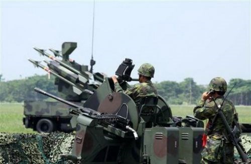 Lực lượng quân sự Đài Loan đồn trú bất hợp pháp trên đảo Ba Bình trong quần đảo Trường Sa thuộc chủ quyền Việt Nam, núp dưới danh nghĩa "cảnh sát biển".