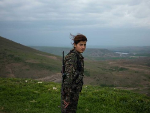 18-year-old YPJ fighter Torin Khairegi: “We live in a world where women are dominated by men. We are here to take control of our future..I injured an ISIS jihadi in Kobane. When he was wounded, all his friends left him behind and ran away. Later I went there and buried his body. I now feel that I am very powerful and can defend my home, my friends, my country, and myself. Many of us have been matryred and I see no path other than the continuation of their path."  Newsha Tavakolian for TIME  Zinar base, Syria  "I joined YPJ about seven months ago, because I was looking for something meaningful in my life and my leader [ Abdullah Ocalan] showed me the way and my role in the society. We live in a world where women are dominated by men. We are here to take control of our own future. We are not merely fighting with arms; we fight with our thoughts. Ocalan's ideology is always in our hearts and minds and it is with his thought that we become so empowered that we can even become better soldiers than men. When I am at the frontline, the thought of all the cruelty and injustice against women enrages me so much that I become extra-powerful in combat. I injured an ISIS jihadi in Kobane. When he was wounded, all his friends left him behind and ran away. Later I went there and buried his body. I now feel that I am very powerful and can defend my home, my friends, my country, and myself. Many of us have been matryred and I see no path other than the continuation of their path."