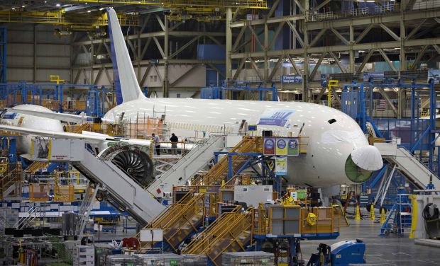 A Boeing 787 sits on the assembly line at the company's operations in Everett, Washington in this file photo taken October 18, 2012. The Commerce Department said on Thursday durable goods orders, items ranging from toasters to aircraft that are meant to last three years or more, dropped 18.2 percent, the largest decline since the series started in 1992. That partially reversed July's aircraft-driven 22.5 percent surge.   REUTERS/Andy Clark/Files  (UNITED STATES - Tags: TRANSPORT BUSINESS)
